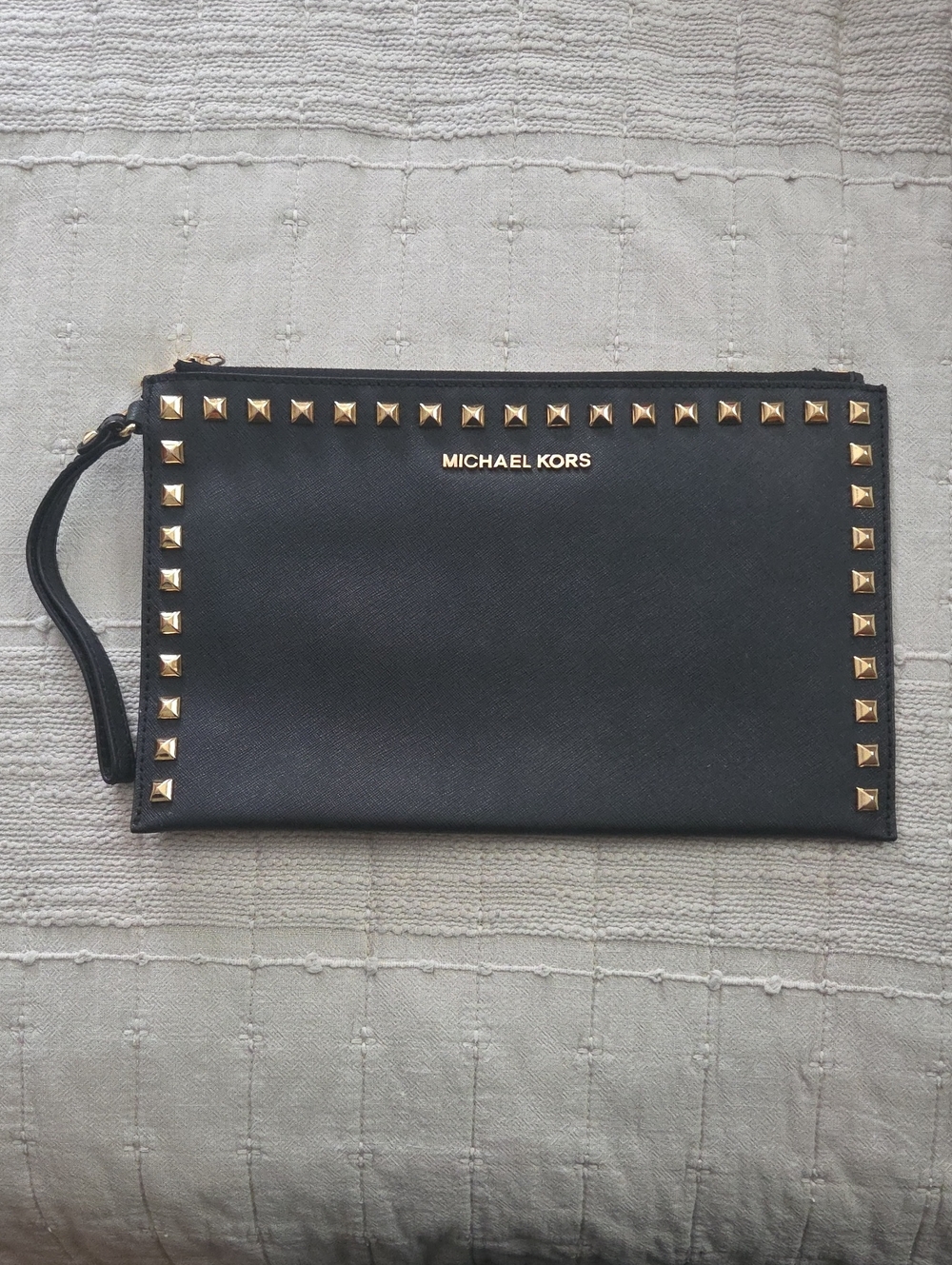 Michael Kors Black Wristlet with Gold Studs